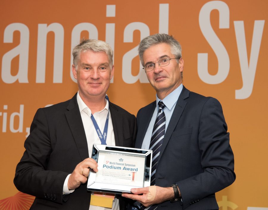 Dr Finn Majlergaard winning award for best Keynote speech at World Financial Symposium